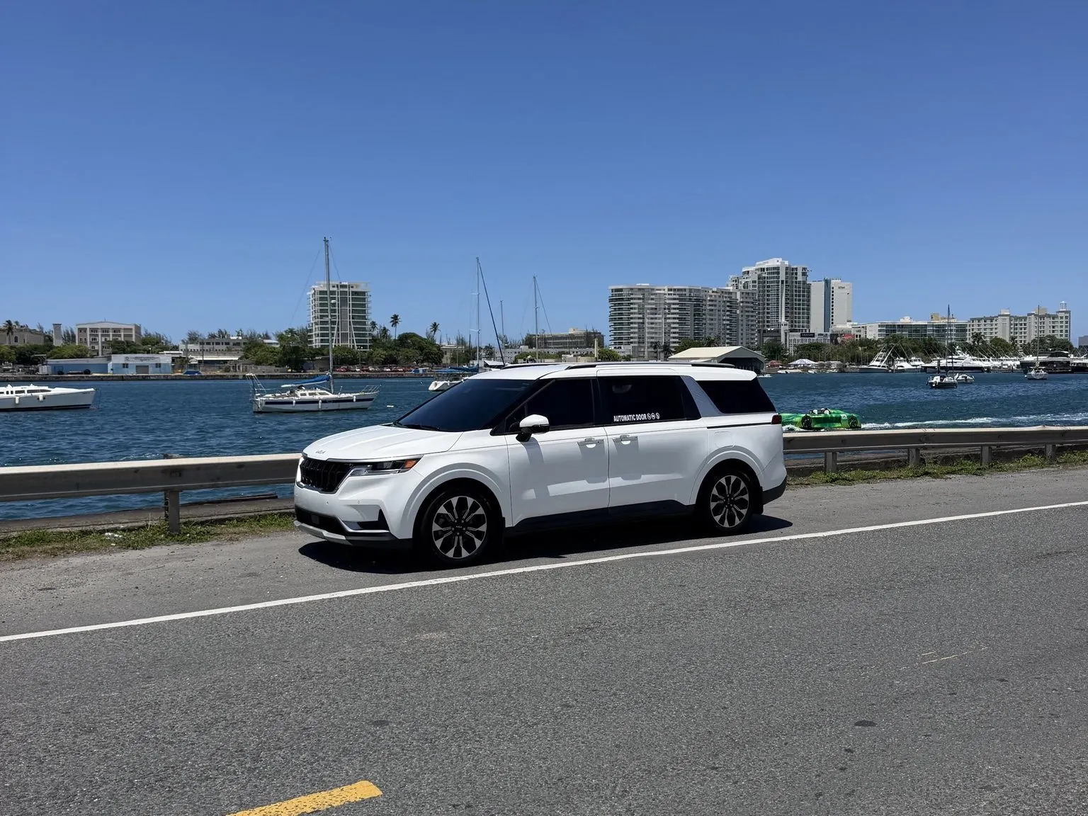 Island Ride PR LLC white private transportation vehicle